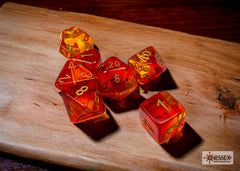 Chessex Gemini Translucent Red-Yellow/gold Polyhedral 7-Dice Set | Mega City Incorporated