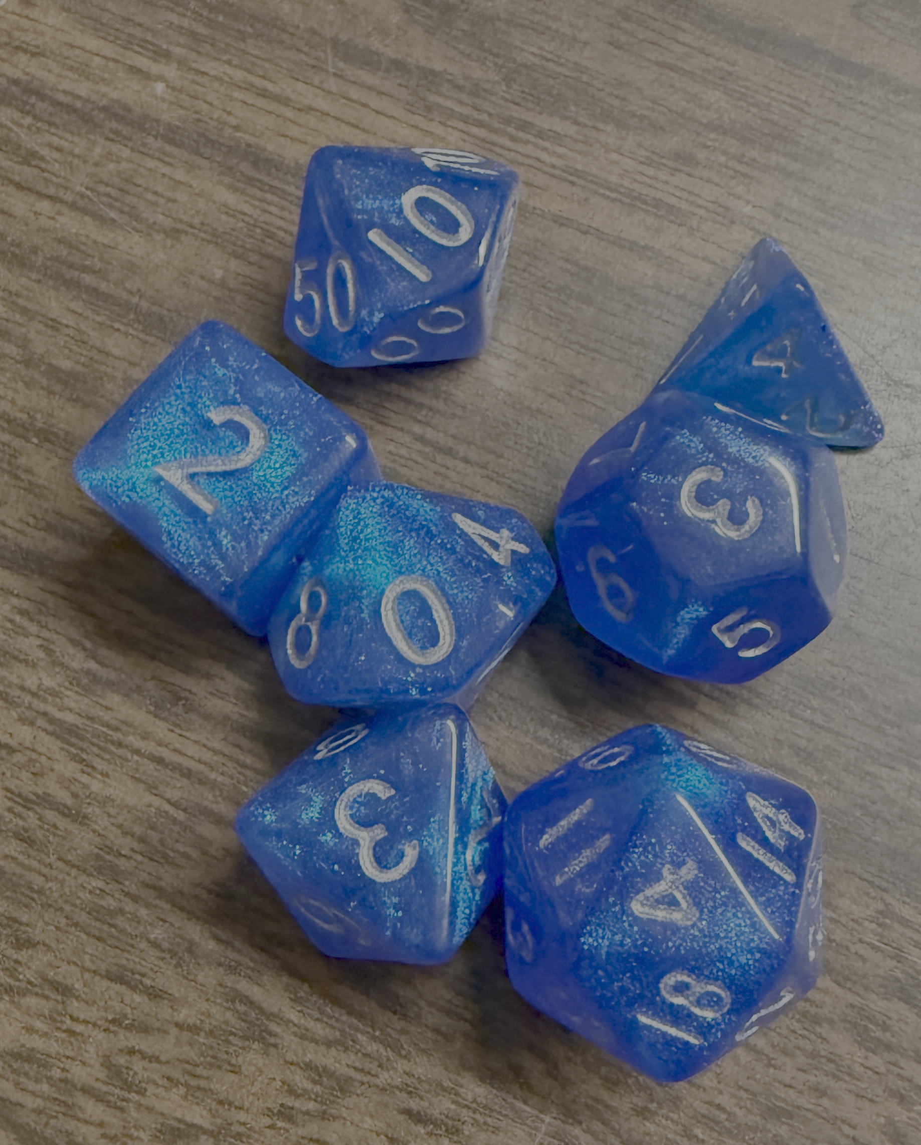 Metallic Dice Games Stardust: Blue w/ Silver Numbers 16mm Poly Dice Set | Mega City Incorporated